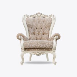 Ornate vintage armchair with tufted upholstery.